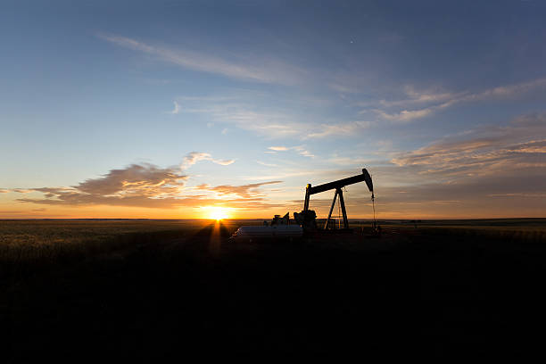 istock Oil Well Sunrise 184374958
