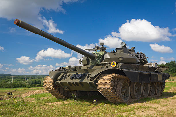 Old Russian tank T-55 Old Russian tank T-55 against blue skySee more MILITARY images here: armored tank photos stock pictures, royalty-free photos & images