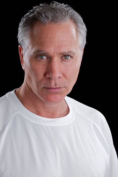 istock Serious middle age man with white shirt 184375069