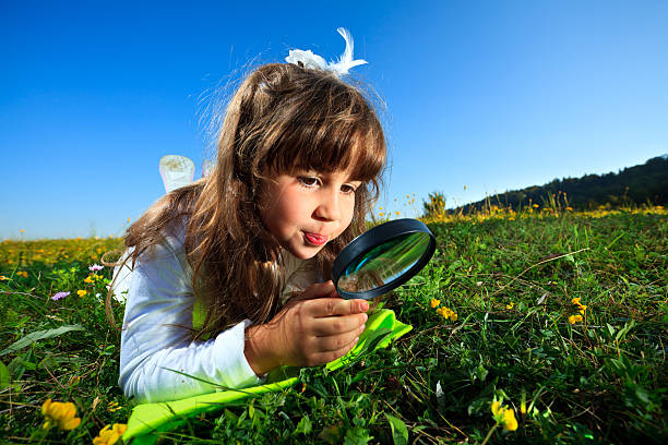 istock Little Girl Exploring Nature 184375449