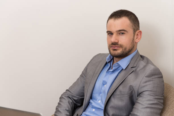 istock Man Working on Laptop at Home 1843759025