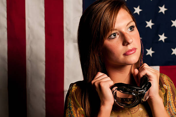 istock Girl standing in front of flag 184376094