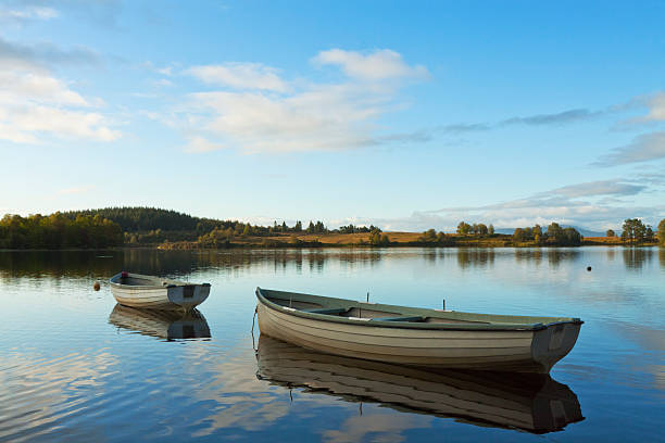 istock Idyllic lake with boats 184376498