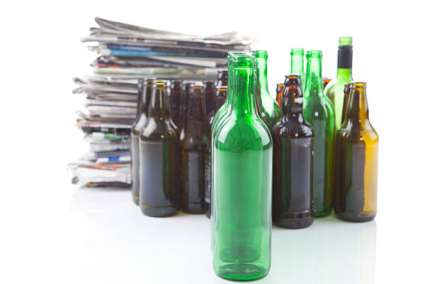 istock Old Newspapers And Bottles For Recycling 184376530
