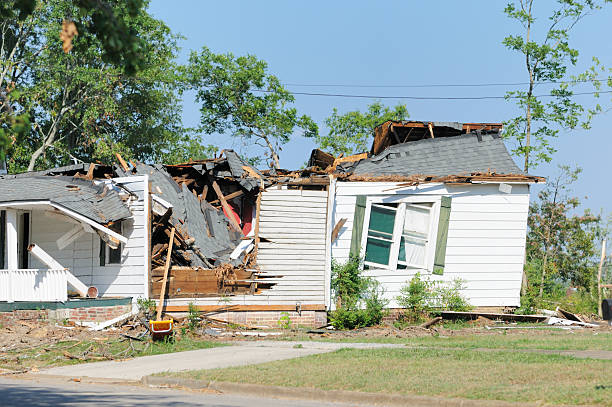 istock Home heavily damaged by tornado 184376679