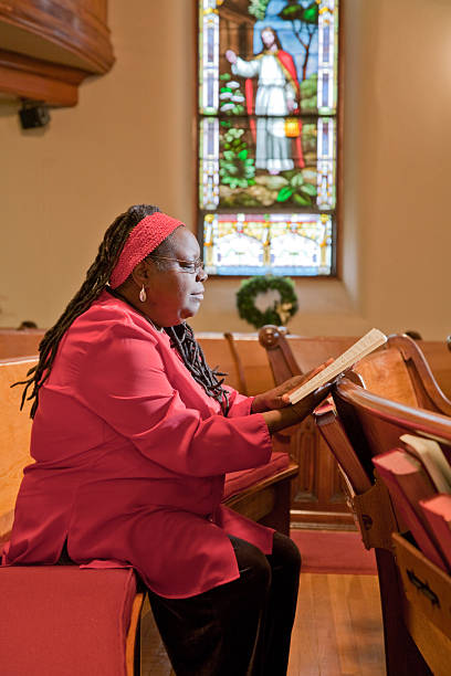 istock Christian woman reading the bible 184376863
