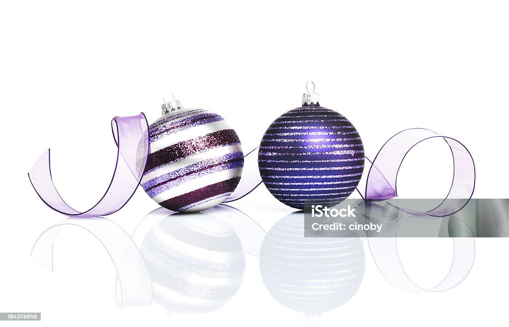 Purple Christmas Decoration purple christmas decoration with christmas baubles and ribbon isolated on white Purple Stock Photo