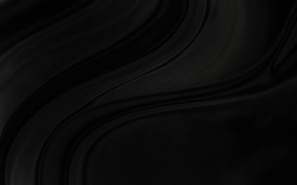 istock Black gray satin dark fabric texture luxurious shiny that is abstract silk cloth background with patterns soft waves blur beautiful. 1843774415
