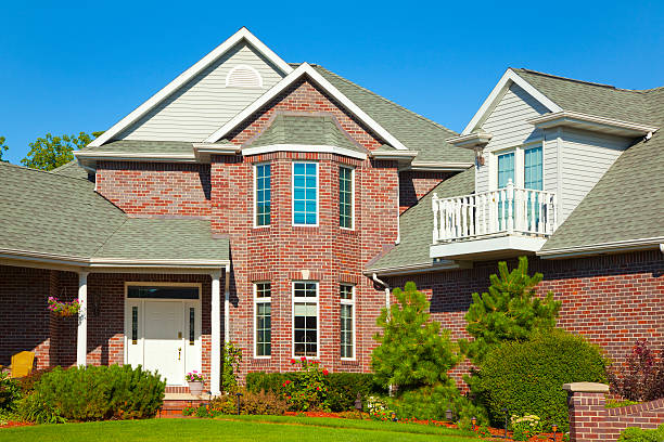 istock Two Story Brick and Vinyl Mansion 184377815