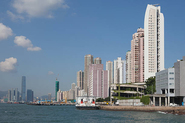 Hong Kong Skyline Commercial buildings and residential building stand in Hong Kong. international commerce center stock pictures, royalty-free photos & images