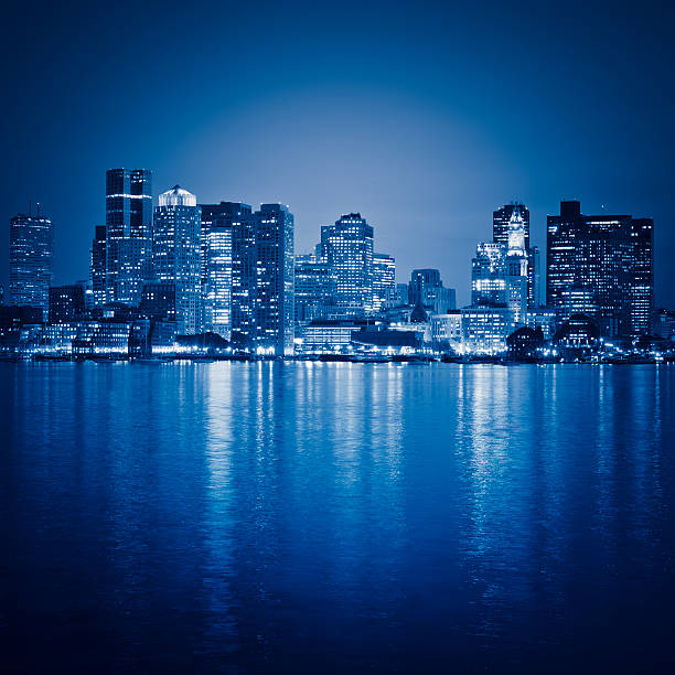 Boston skyline from the south port at night  boston skyline night skyscraper stock pictures, royalty-free photos & images