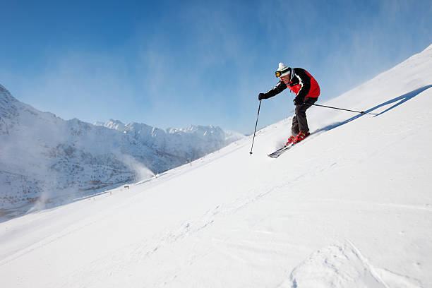 istock Skier at the top of a Mountain 184378075