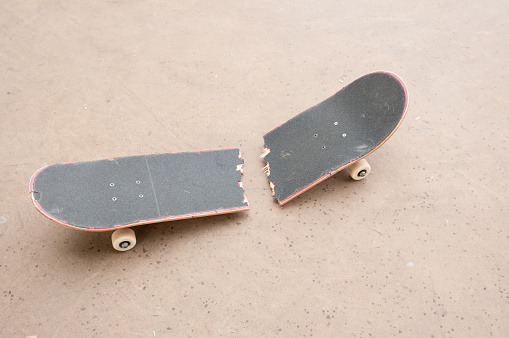 Snapped skateboard deck.