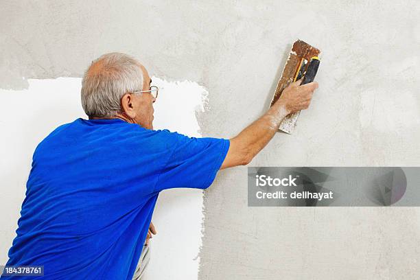 Foto de Plasterer e mais fotos de stock de Gesso para construção - Gesso para construção, Parede, Estuque