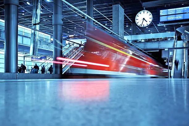 "Train leaving the Station,  motion blurmain railway-station of Berlin - Germany"