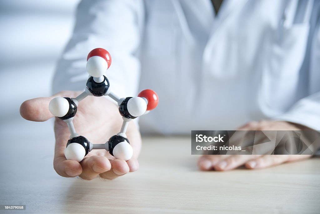 Molecular Structure A scientist holding the model of a moleculeFor more science related images see this lightbox: Biology Stock Photo