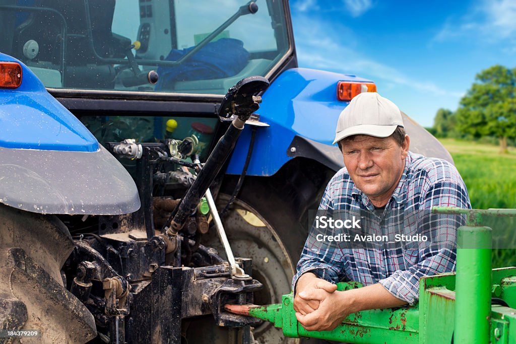 Agricultor e o tractor - Royalty-free Adulto Foto de stock