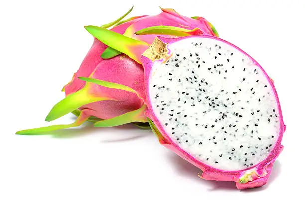 Close-up of slice of dragon fruit. Isolated on the white background