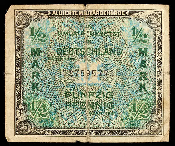 Photo of German money from 1944 half mark alliance military authority