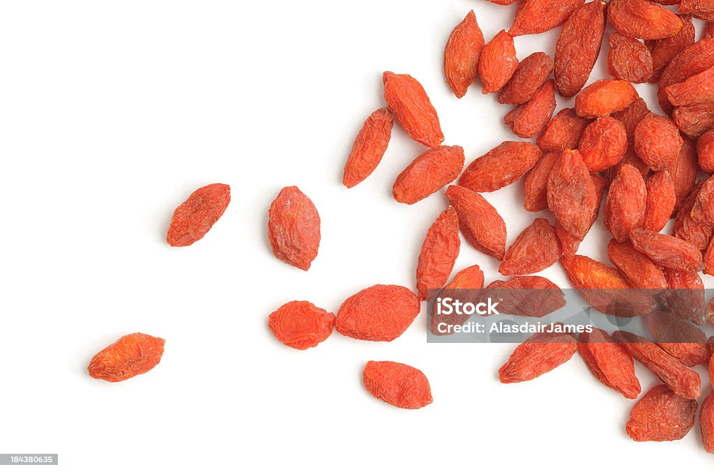 Lobo (goji frutas vermelhas espalhadas - Foto de stock de Baga - Fruta royalty-free