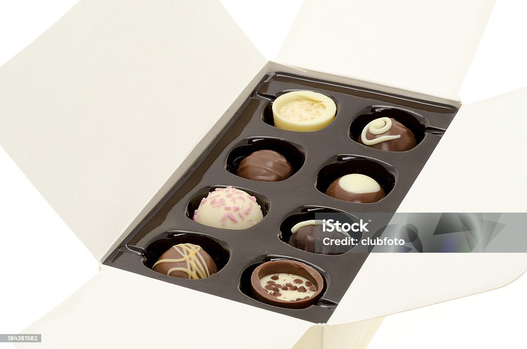 Ouvrir une boîte de chocolats - Photo de Aliment libre de droits