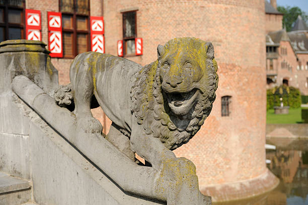 istock Stone lion in front of castle De Haar 184381656