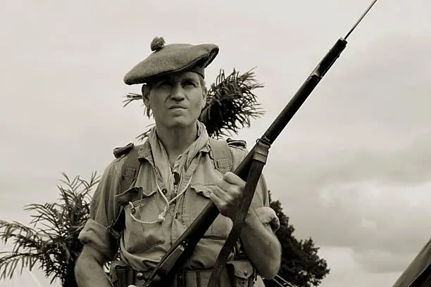 WW2 British army soldier from a Scottish regiment during the North African campaign.Picture has been aged to give the feel of a vintage photograph.