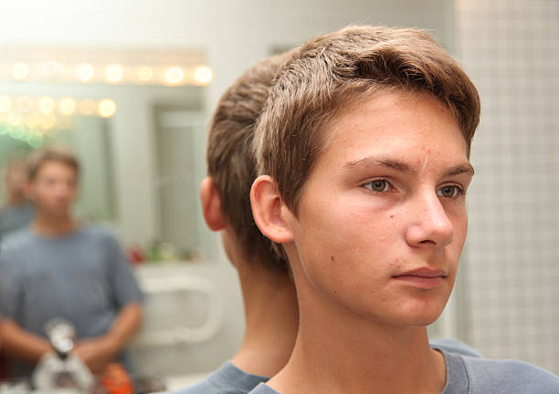 Reflecting teenager Reflecting teenager; multiple mirror reflections. Please see  related pictures: janus head stock pictures, royalty-free photos & images