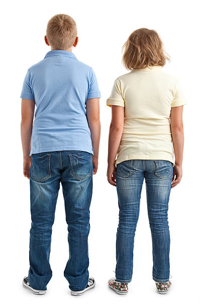 istock back of boy and girl 184382243