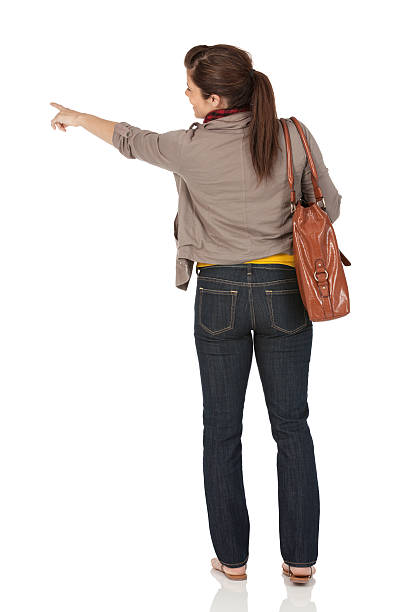 Rear view of a woman pointing