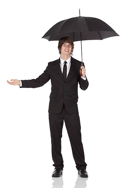 istock Businessman with an umbrella 184382929