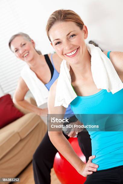 Women Resting After A Home Exercise Stock Photo - Download Image Now - Active Lifestyle, Active Seniors, Adult