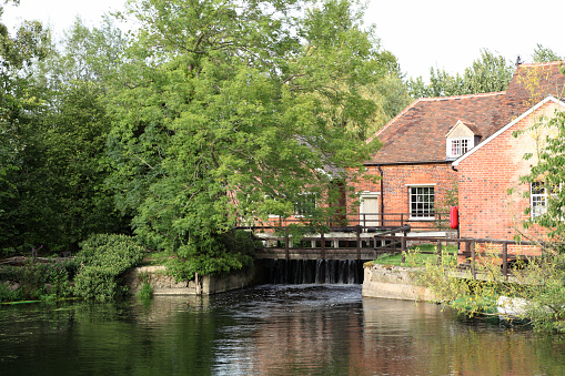 flatford mill and river stour essex england - famous landmark painted by john constable