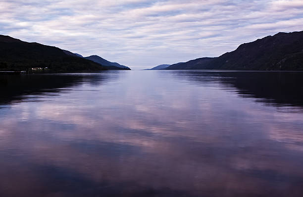 Loch Ness "Idyllic Loch Ness shot from Fort Augustus in Scotland, UK in the early hours of the morning." fort augustus stock pictures, royalty-free photos & images