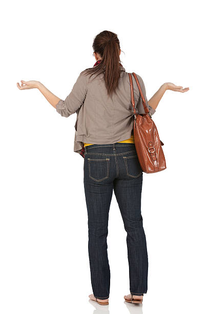 istock Rear view of a woman gesturing 184385105
