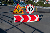Sign of roadworks and speed up to 40 km.