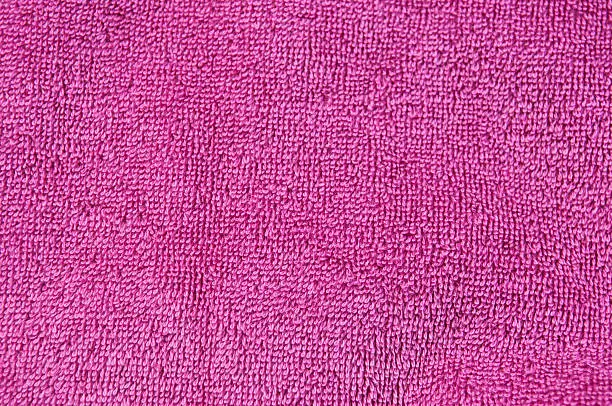 Photo of Texture of pink towel