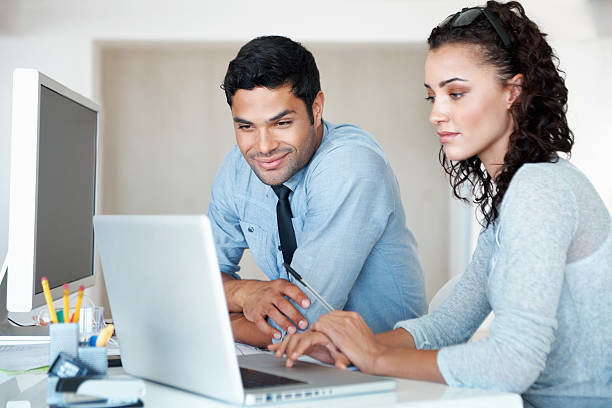 istock Business people working on laptop 184385451