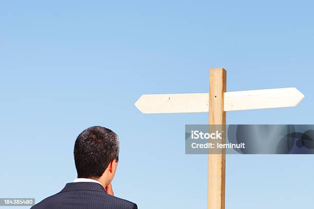 Businessman And Blank Directional Sign Post Stock Photo - Download Image Now - 30-39 Years, Adult, Adults Only