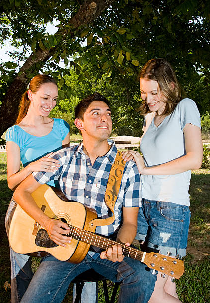 istock Guitar Player & Two Fans 184385558