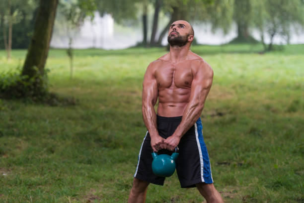 istock Fitness Kettlebell Swing Exercise Man Workout Outdoors 1843858871