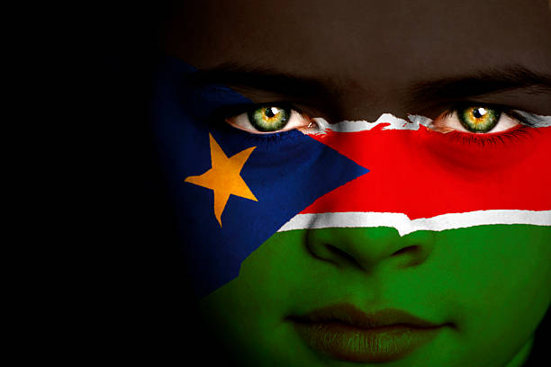 south sudan flag jungen - jingoistic stock-fotos und bilder