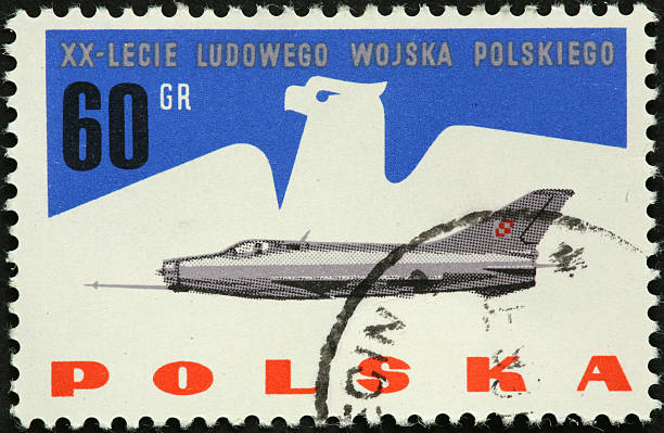 istock vintage fighter jet on an old Polish postage stamp 184385974