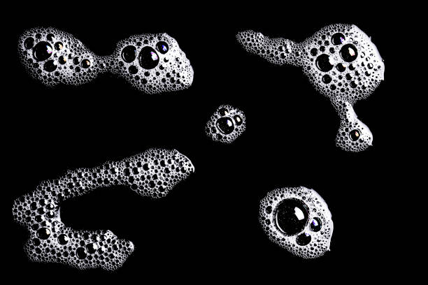 istock Water foam texture. White foam structure. Bubble background. Washing suds pattern. Chemical detergent backdrop. 1843862057