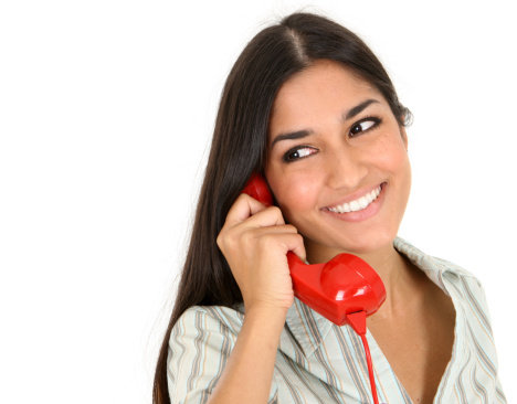 Woman on the phone with a big smile