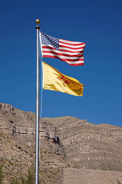 istock USA and State of New Mexico Flags 184386487