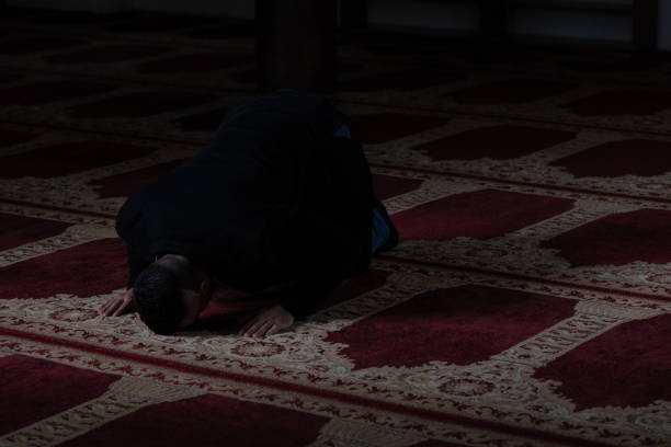 istock Businessman Muslim Praying in Mosque 1843867383