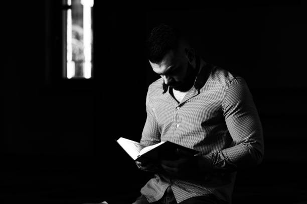 istock Muslim Man Is Reading The Koran 1843867910