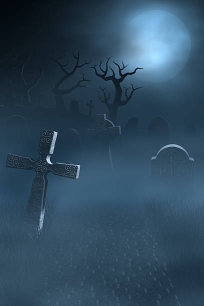 istock Tombstones on a spooky misty graveyard, full moon at night 184387267