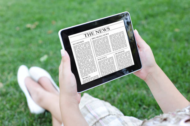 istock Reading news on digital tablet 184387477
